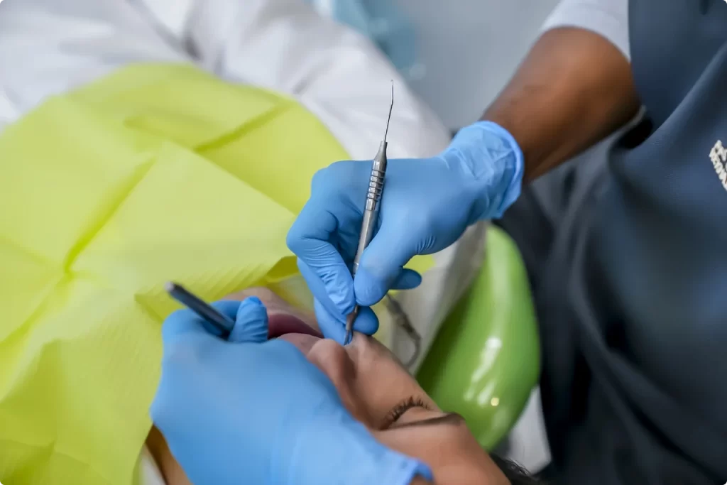 Patient undergoing tooth extraction procedure